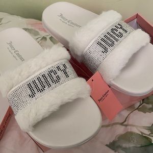 Juicy Couture white furry slides.